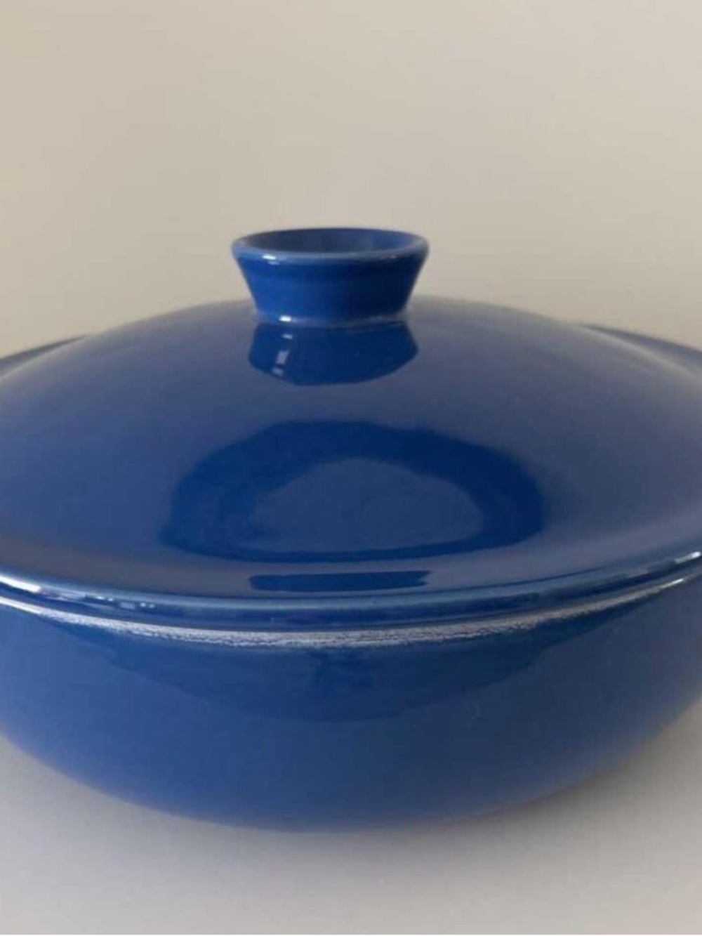 Emile Henry Covered Ceramic Dutch Oven in Deep Blue - Oven to Table Serving Dish